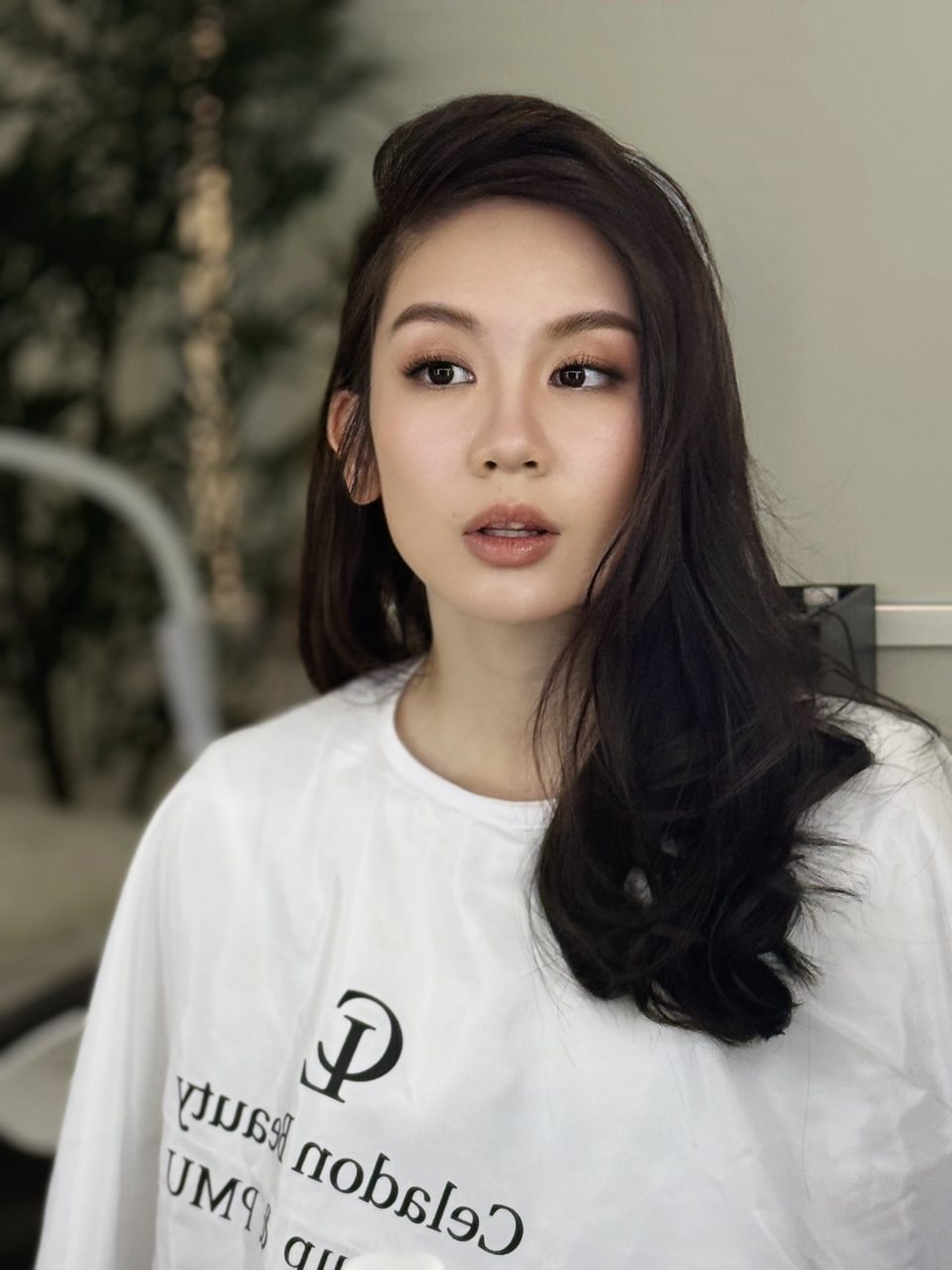 Soft glam with sculpted lashes and voluminous waves