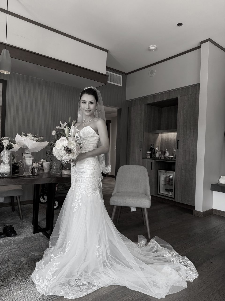 Black-and-white portrait of a bride on her wedding morning