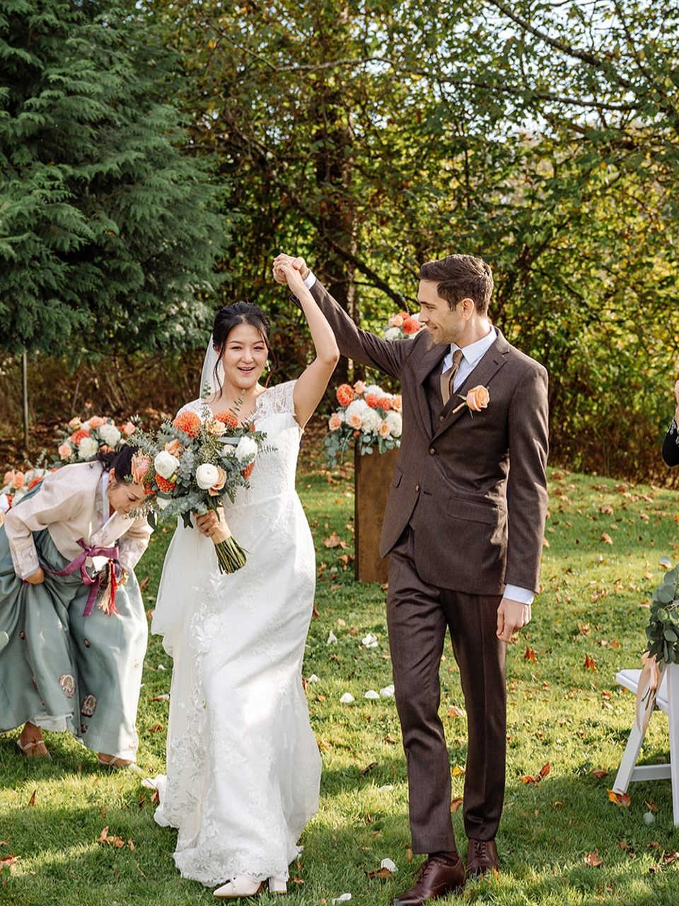 Couple celebrating at an outdoor garden ceremony