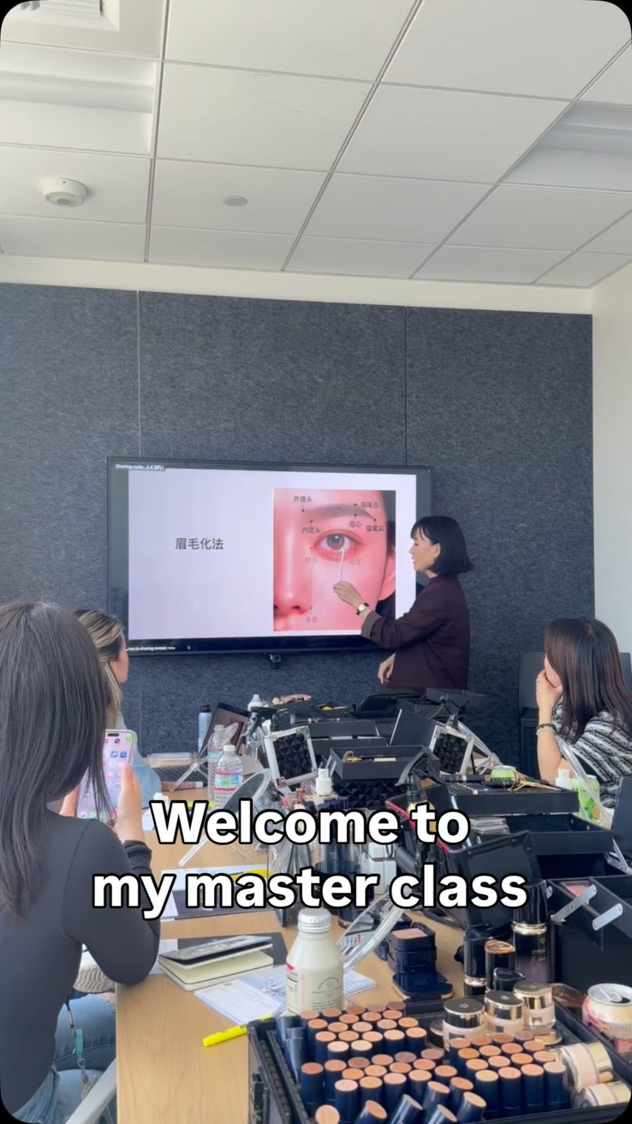 Group masterclass with a presentation screen